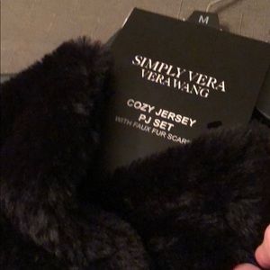 A faux fur black scarf by Simply Vera